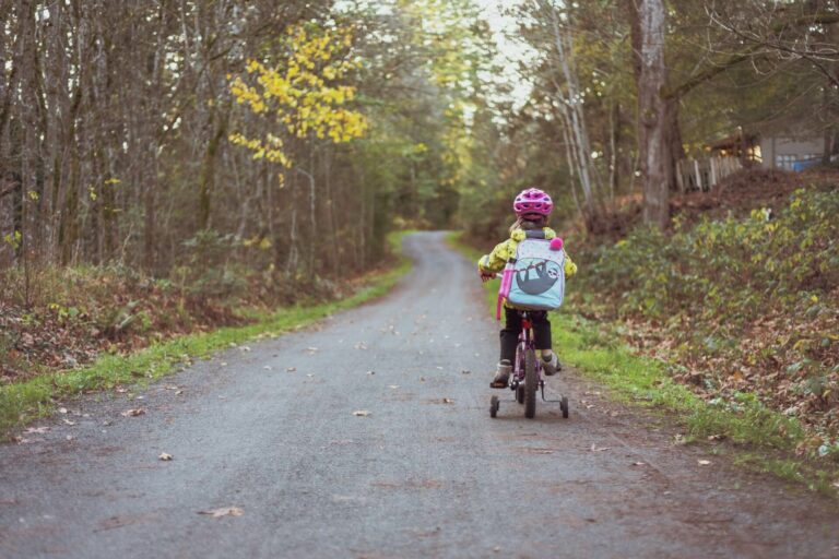 Little girl on a bicycle