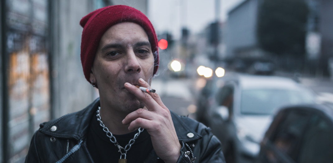 Punk smoking in Manchester City Centre Sex Pistols Gig