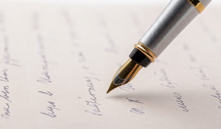 Content blog. Feature image for Aqueous blog on short form content vs long form content. image shows fountain pen writing on paper