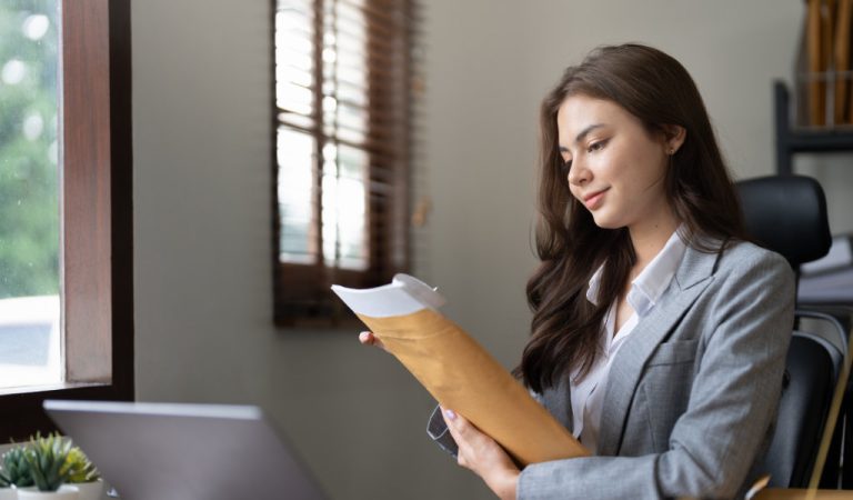 Solicitor in the office looking at law papers