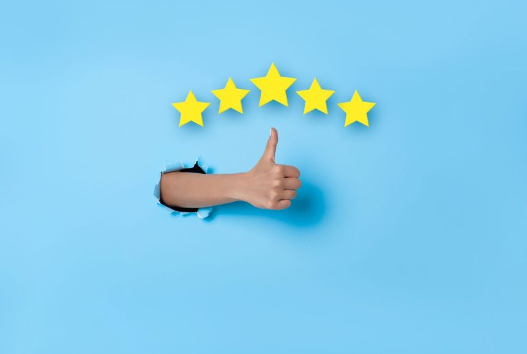 Customer Experience Woman hand thumb up vote on five star excellent rating on blue background. Review and feedback concept